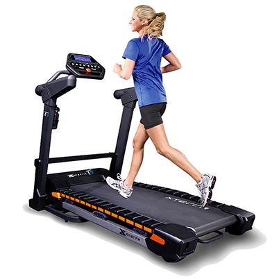 Woman with blonde hair running on the Xterra T9 treadmill